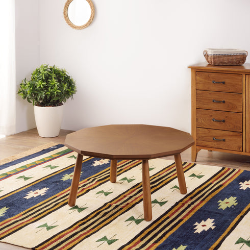 12角形の天板と丸い脚を組み合わせたデザインが個性的で存在感を放つこたつテーブルです。