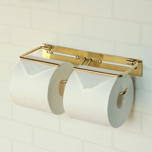 【時を刻む、美しい佇まい】
華やかながらも落ち着きのある真鍮の風合いが、空間に調和し、ペーパーをしっかりと支える機能美で、穏やかな時間の流れを感じさせてくれます。