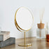 落ち着いたゴールドのフレームと丸形のミラーが目を惹く、卓上ミラー"LINO(リノ)"のHタイプ。