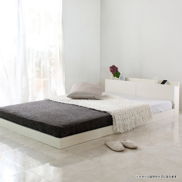 シンプルでスタイリッシュなデザインの棚付きフロアベッドです。